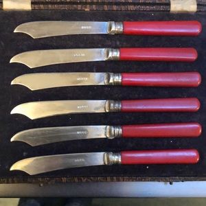 Victorian silver, fish knives from England.